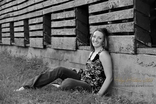 Picture This Photography | www.paigespicturethis.com | high school senior girl black and white on a farm with a barn; lines